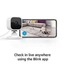 Blink Mini - Compact indoor plug-in smart security camera, 1080p HD video, night vision, motion detection, two-way audio, easy set up, Works with Alexa – 4 cameras (White)