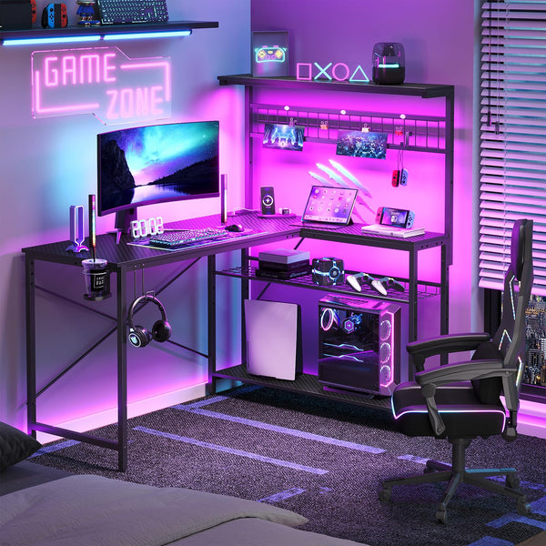 Bestier Gaming Desk 51" L-Shaped, with Power Outlets & LED Lights- 4 Tier Shelves, Reversible Gamer Table with Hooks & Cup Holder for Home Office Carbon Fiber Black