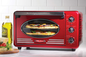 Nostalgia Oven, Toast, AirFry, Broil Functions Large Capacity Fits Slices of Bread Two 12 in. Pizzas-Includes Baking Pan and Frying Basket, 21 Qt, Metallic Red